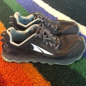 Medium worn trail running shoes. Lone peak altra’s.
